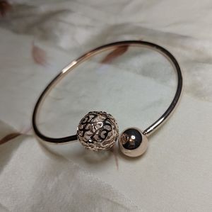 Rose gold bauble bangle